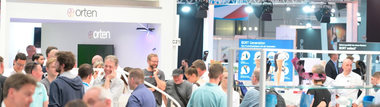 Numerous visitors explore the booths in an exhibition hall at OTWorld. Numerous visitors explore the booths in an exhibition hall at OTWorld.
