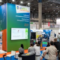Visitors follow a presentation at OTWorld in the OTWorld shoe-technology area, the meeting place for orthopaedic footwear technology Visitors follow a presentation at OTWorld in the OTWorld shoe-technology area, the meeting place for orthopaedic footwear technology