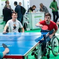 Wheelchair users play table tennis. Wheelchair users play table tennis.